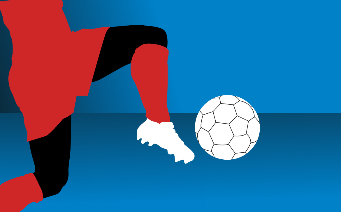 Soccer: a player’s boot striking the ball.
